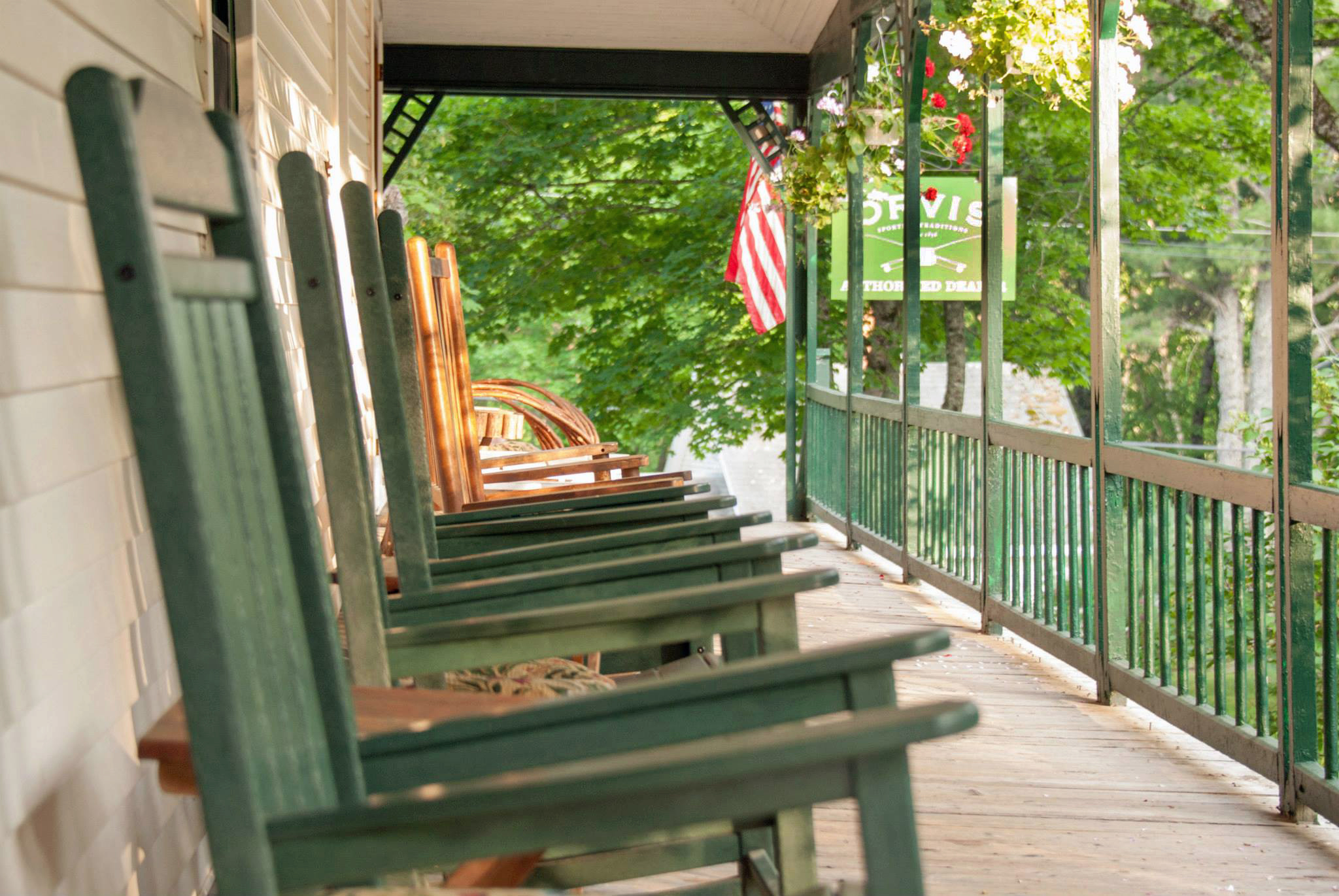 Rockers on the porch of a Classic New England Fishing and Hunting Lodge